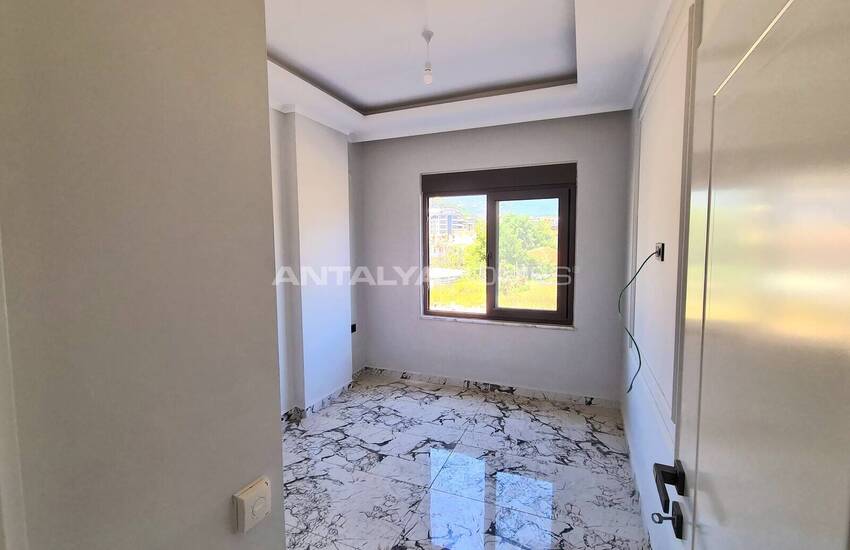 Alanya'da Zengin Olanaklı Sitede Şehir ve Dağ Manzaralı Daireler 24