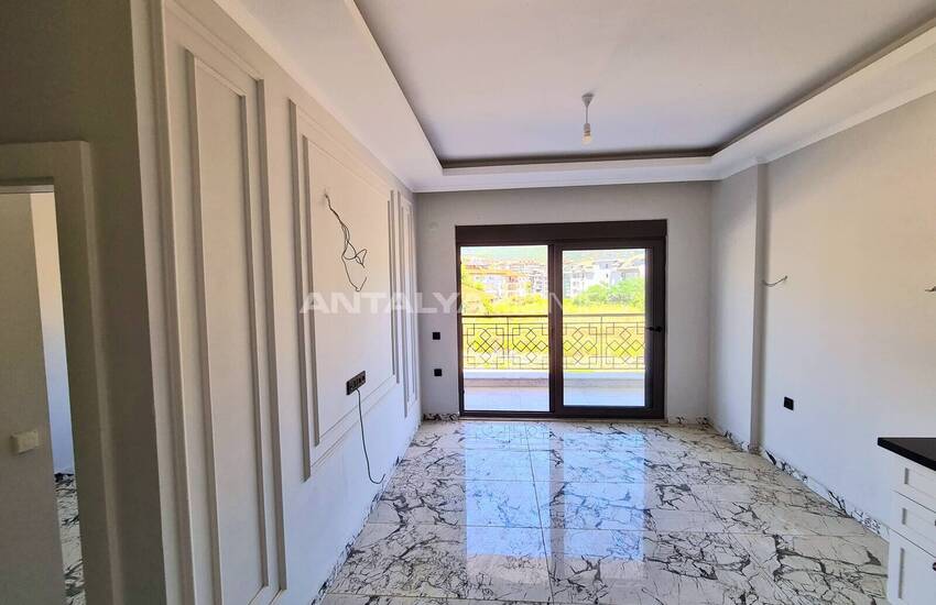 Alanya'da Zengin Olanaklı Sitede Şehir ve Dağ Manzaralı Daireler 21