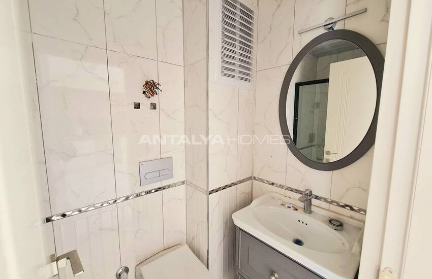 Стильные готовые квартиры в комплексе с бассейном в Алании 47