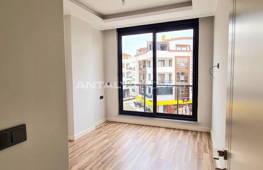 Стильные готовые квартиры в комплексе с бассейном в Алании 42