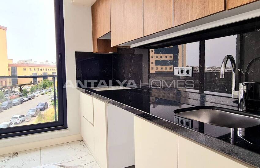 Стильные готовые квартиры в комплексе с бассейном в Алании 35