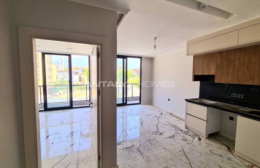 Стильные готовые квартиры в комплексе с бассейном в Алании 36