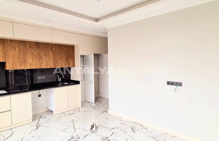 Стильные готовые квартиры в комплексе с бассейном в Алании 34