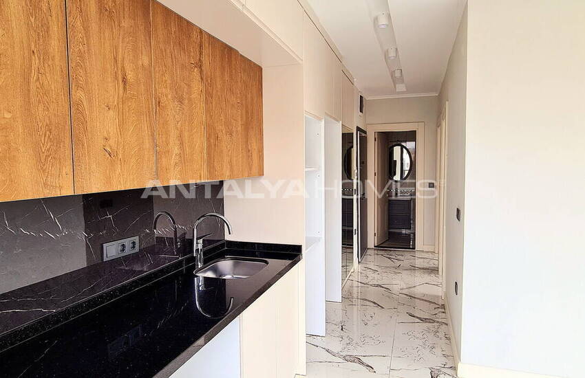 Стильные готовые квартиры в комплексе с бассейном в Алании 37