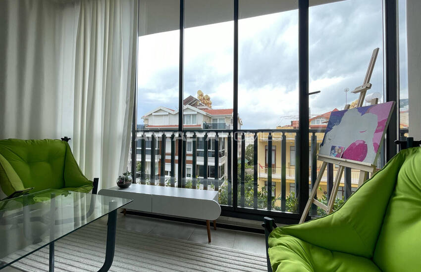 Beach-side Flat in a Complex with Pool in Alanya Center 24