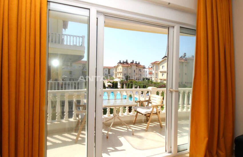 Меблированная квартира в комплексе с бассейном в Белеке Анталья 26