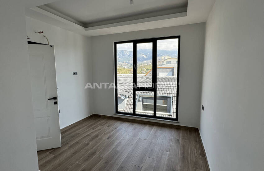 Alanya Kargıcak'ta Deniz ve Dağ Manzaralı Şık Tasarımlı Daireler 14
