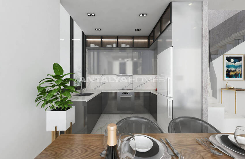 Квартиры с богатыми удобствами рядом с пляжем в Алании 31