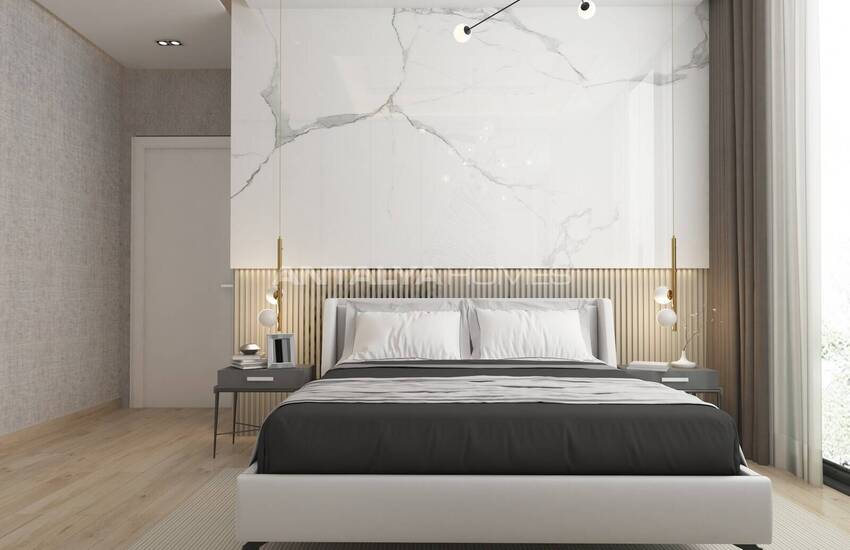 Квартиры с богатыми удобствами рядом с пляжем в Алании 32