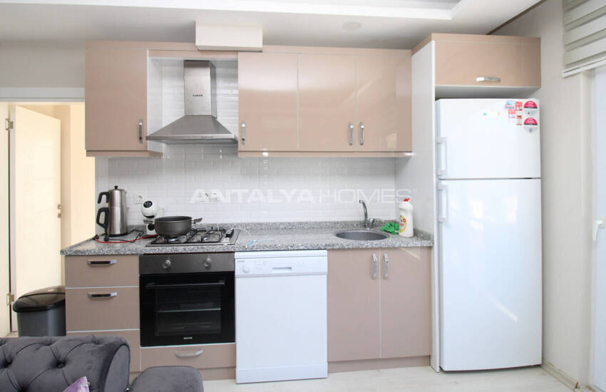 Меблированная Квартира в комплексе с бассейном в Гюзелоба Анталия 13