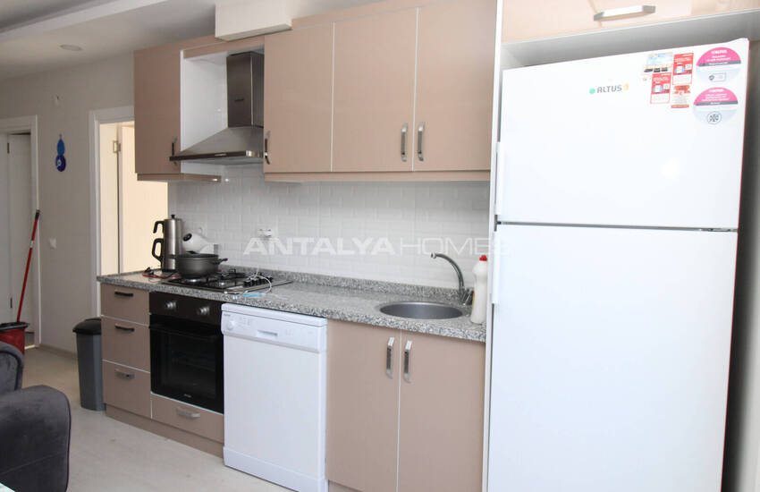 Меблированная Квартира в комплексе с бассейном в Гюзелоба Анталия 14