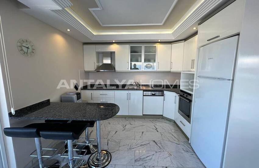 عقارات أنيقة مطلة على البحر للبيع في ألانيا توسمور 32