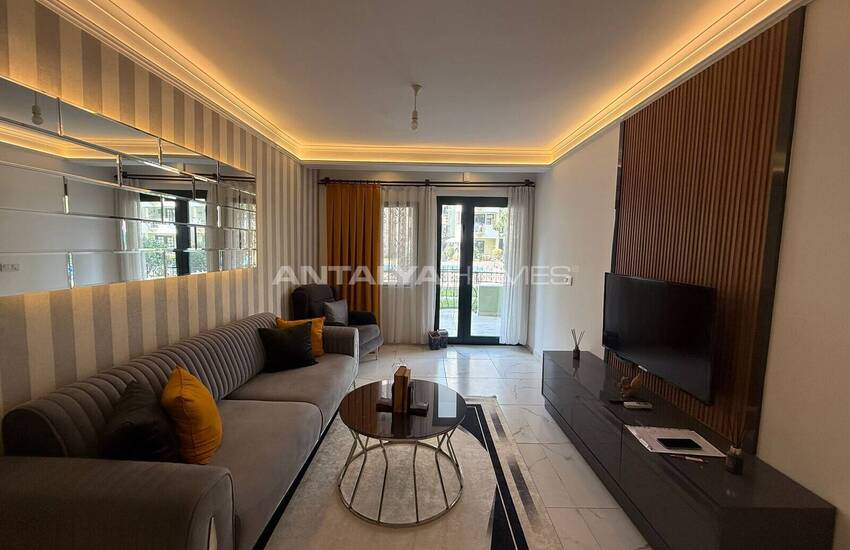 Недвижимость с видом на бассейн в комплексе на берегу моря в Махмутлар 8