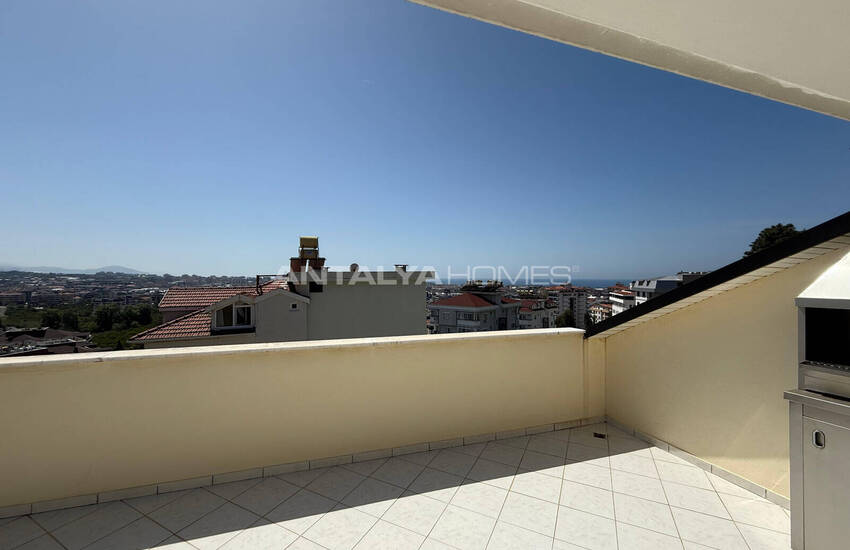 Квартира на крыше с видом на море и город в Алании 18