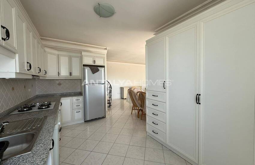 Квартира на крыше с видом на море и город в Алании 10