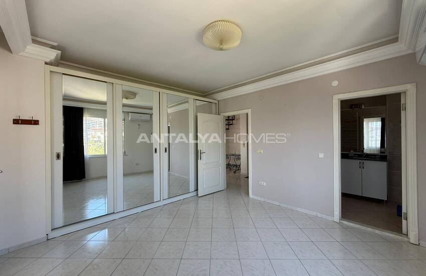 Квартира на крыше с видом на море и город в Алании 11