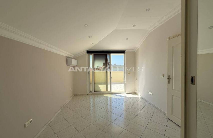 Квартира на крыше с видом на море и город в Алании 14