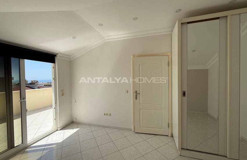 Квартира на крыше с видом на море и город в Алании 13