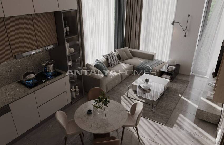 Недвижимость с видом на море и город в центре Алании 14