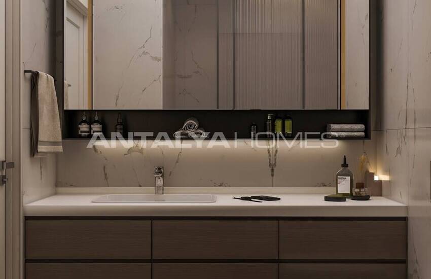 Недвижимость с видом на море и город в центре Алании 16