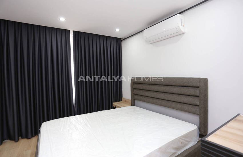 Меблированная квартира рядом с торговым центром в Муратпаше 15