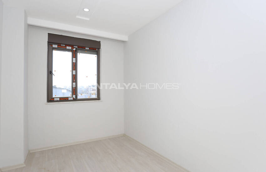 شقق في مجمع سكني يضم مسبحًا وموقف سيارات في أنطاليا 12