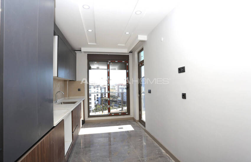 شقق في مجمع سكني يضم مسبحًا وموقف سيارات في أنطاليا 6