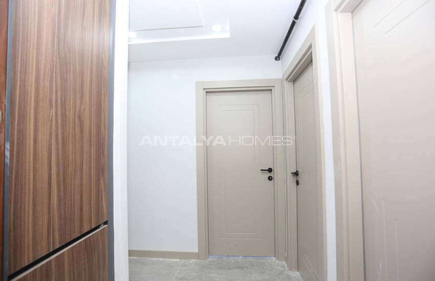 شقق في مجمع سكني يضم مسبحًا وموقف سيارات في أنطاليا 19