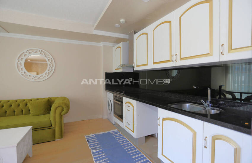 Antalya Konyaaltı’nda Havuz Manzaralı Eşyalı 2+1 Daire 16