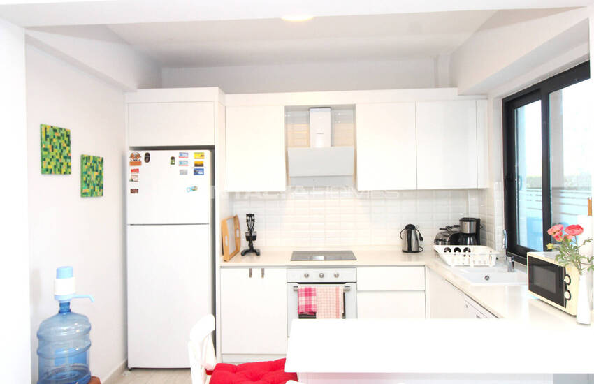 Меблированная квартира 2+1 с садом в комплексе с бассейном в Белеке 18