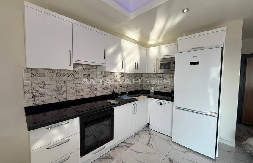 Квартира с 2 спальнями в 2 км от моря в Алании, Авсаллар 12