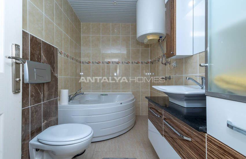 Дуплексная квартира с видом на море, окруженная природой в Алании 34