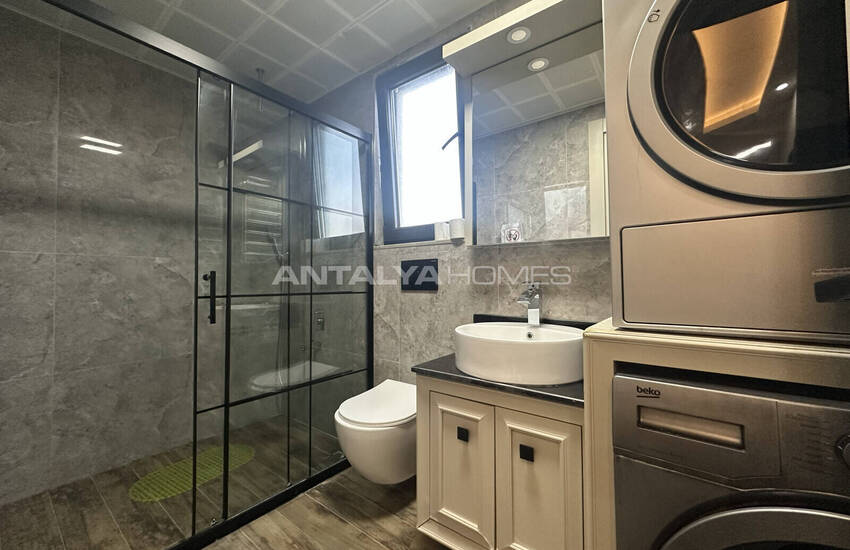 منزل من 4 غرف نوم مع ميزات عالية الجودة في أنطاليا كادري 27