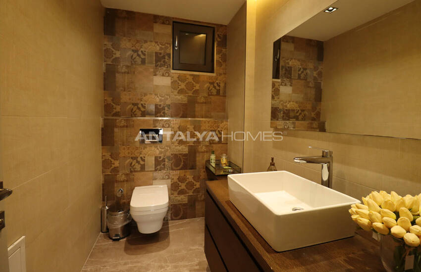 آپارتمان دوبلکس ۴ خوابه با کف باغ در آنتالیا 48