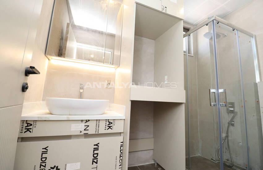 Aksu’da Havuzlu ve Bahçeli Sitede Deniz Manzaralı Daireler 22