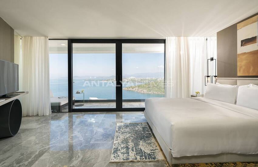 Bodrum Adabükü'nde Özel Koylu Projede Plaja Sıfır Daireler 31