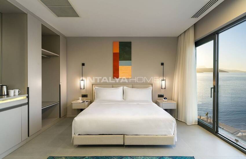 Bodrum Adabükü'nde Özel Koylu Projede Plaja Sıfır Daireler 33