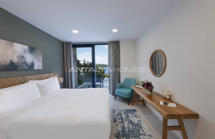 Bodrum Adabükü'nde Özel Koylu Projede Plaja Sıfır Daireler 30