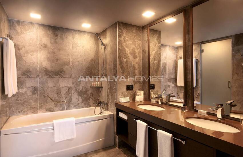 Bodrum Adabükü'nde Özel Koylu Projede Plaja Sıfır Daireler 36