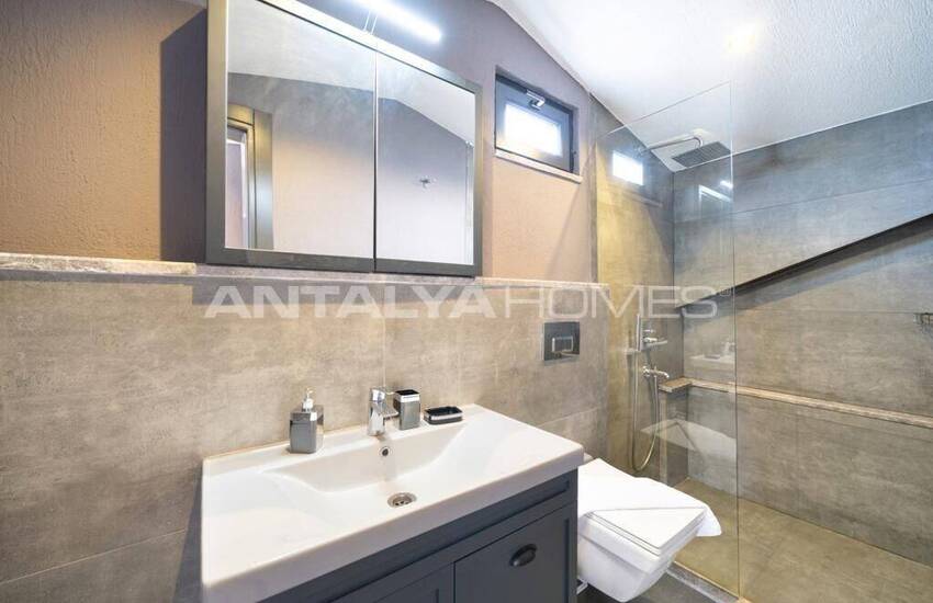 Fethiye Çiftlik'te Açık ve Kapalı Yüzme Havuzlu 3+1 Villa 18