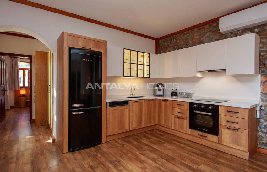 загородный дом на участке площадью 1 091 м² в Каякёй, Фетхие 32