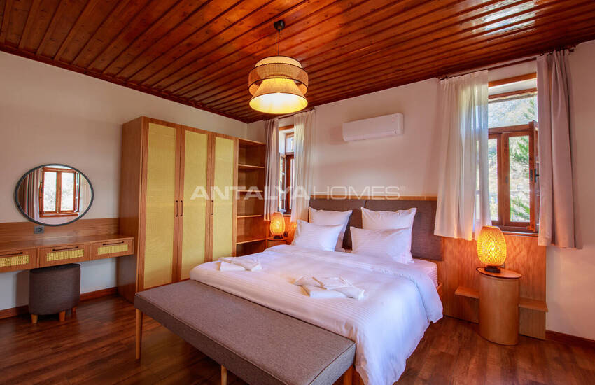 загородный дом на участке площадью 1 091 м² в Каякёй, Фетхие 35