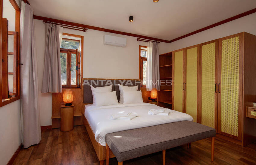 загородный дом на участке площадью 1 091 м² в Каякёй, Фетхие 36