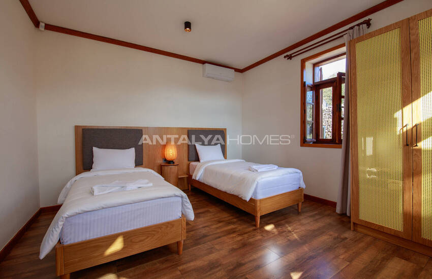 загородный дом на участке площадью 1 091 м² в Каякёй, Фетхие 37