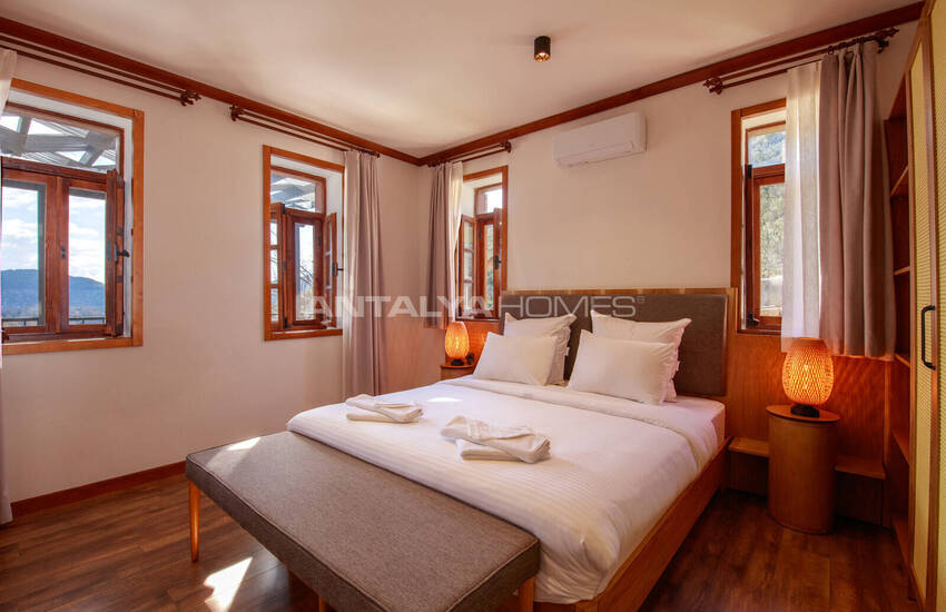 загородный дом на участке площадью 1 091 м² в Каякёй, Фетхие 38