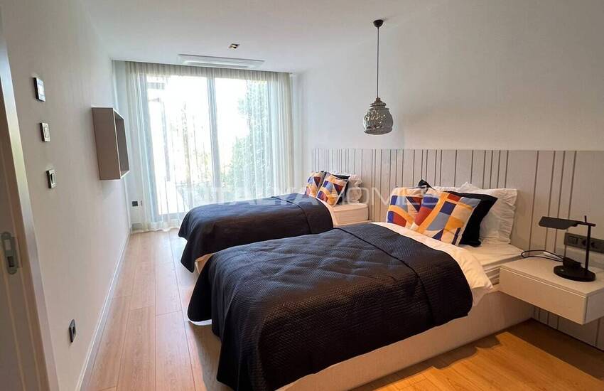 خانه‌هایی با استخر خصوصی و منظره دریا در بدروم گوموشلوک 12