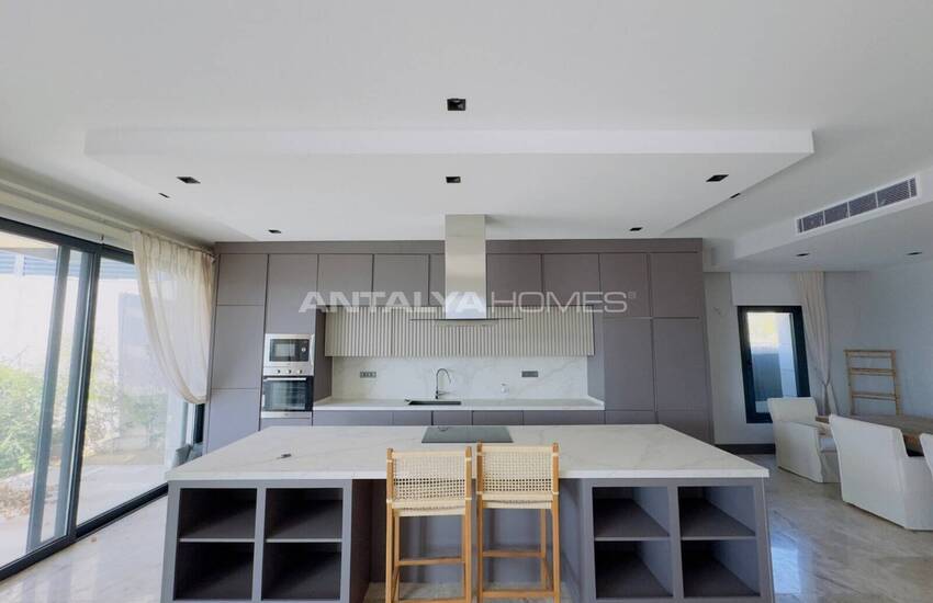 Отдельно стоящий дом с бассейном в закрытом комплексе в Ялыкаваке 7