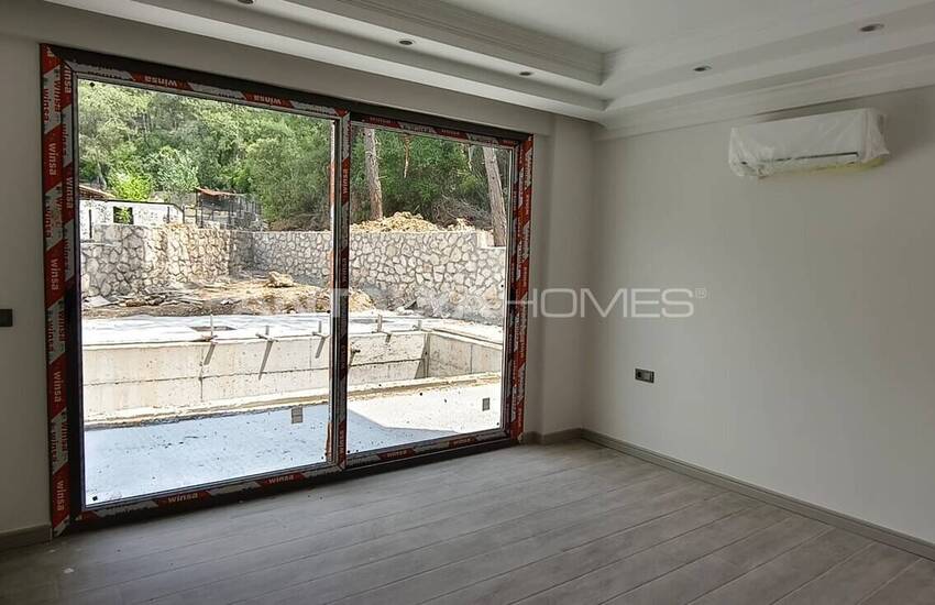 Muğla Fethiye'de Güvenlikli Site İçinde Havuzlu Lüks Evler 33