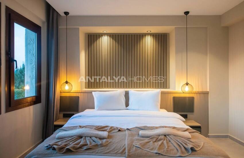 Виллы с частными бассейнами в 10 минутах от пляжа в Фетхие 34