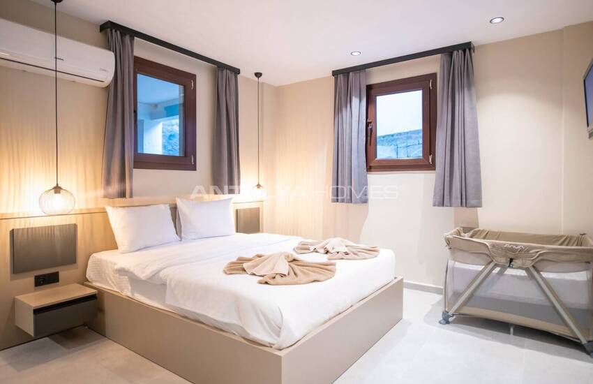 Виллы с частными бассейнами в 10 минутах от пляжа в Фетхие 27